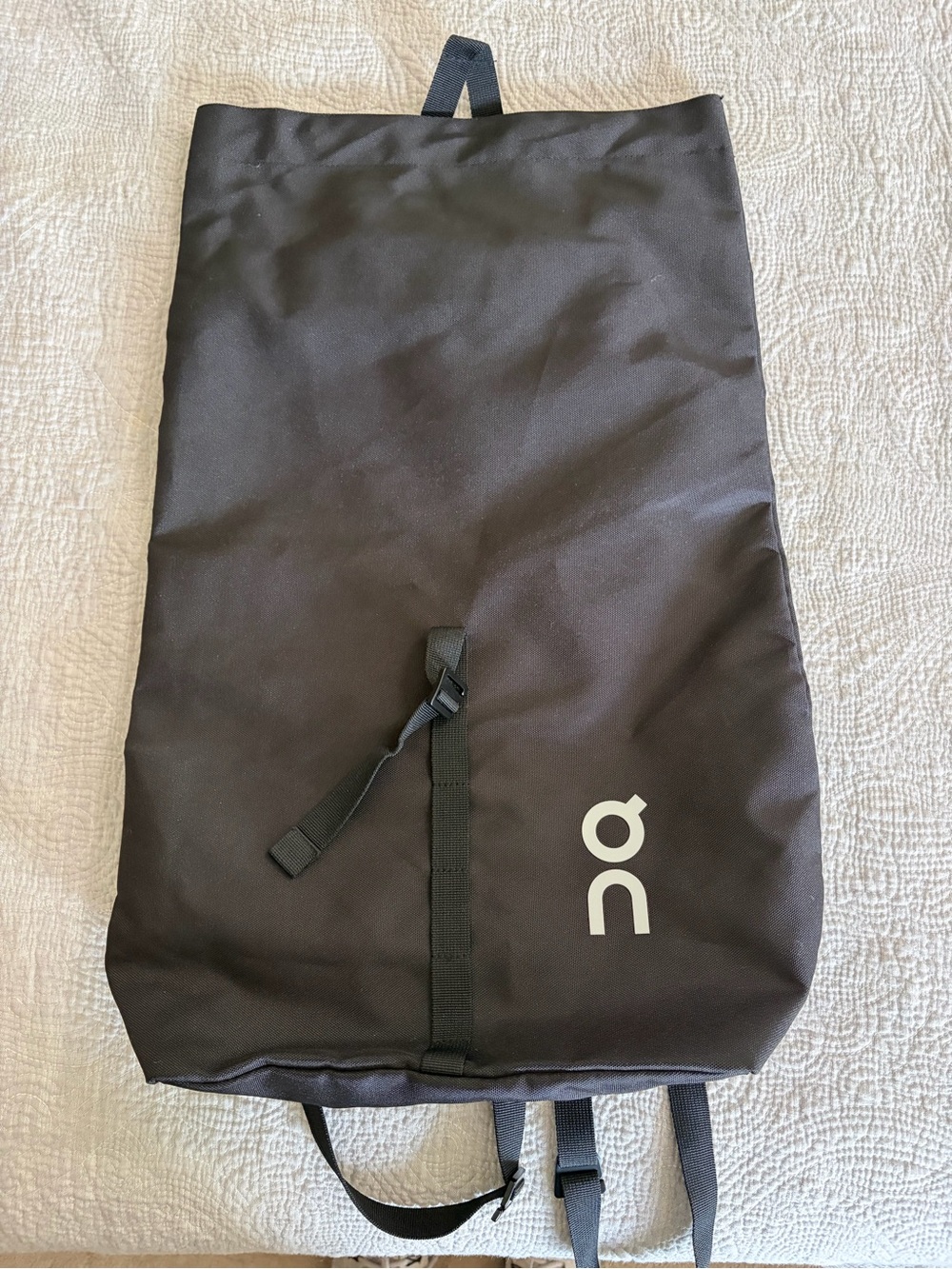 ON running snap top backpack.  Like new condition Black